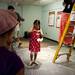 Ann Arbor resident Haesue Baik, 8, opens her device to see if her egg survived on Saturday, July 6. Daniel Brenner I AnnArbor.com